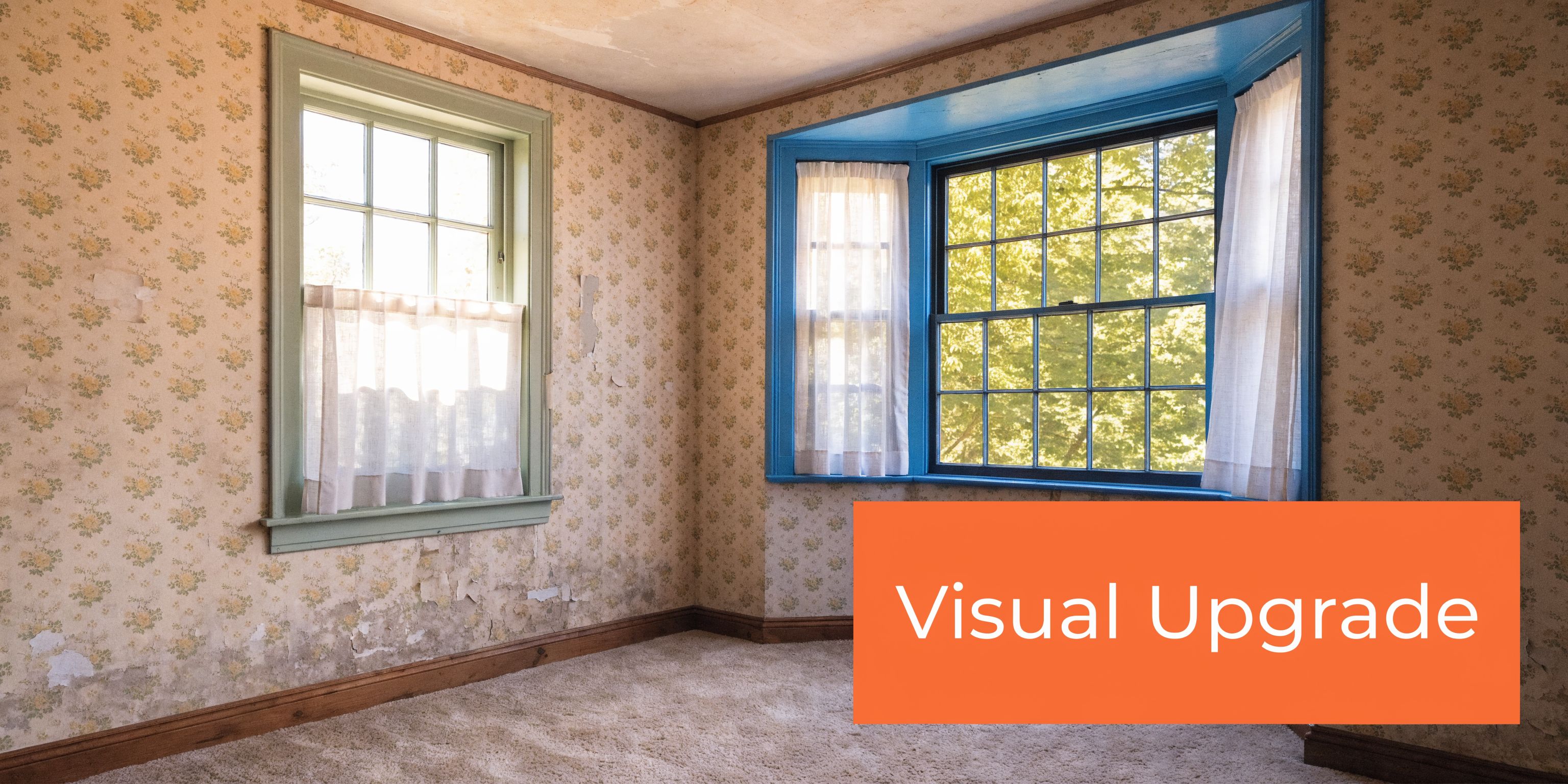 A corner room featuring vintage floral wallpaper and two windows with white curtains needing a home renovation.