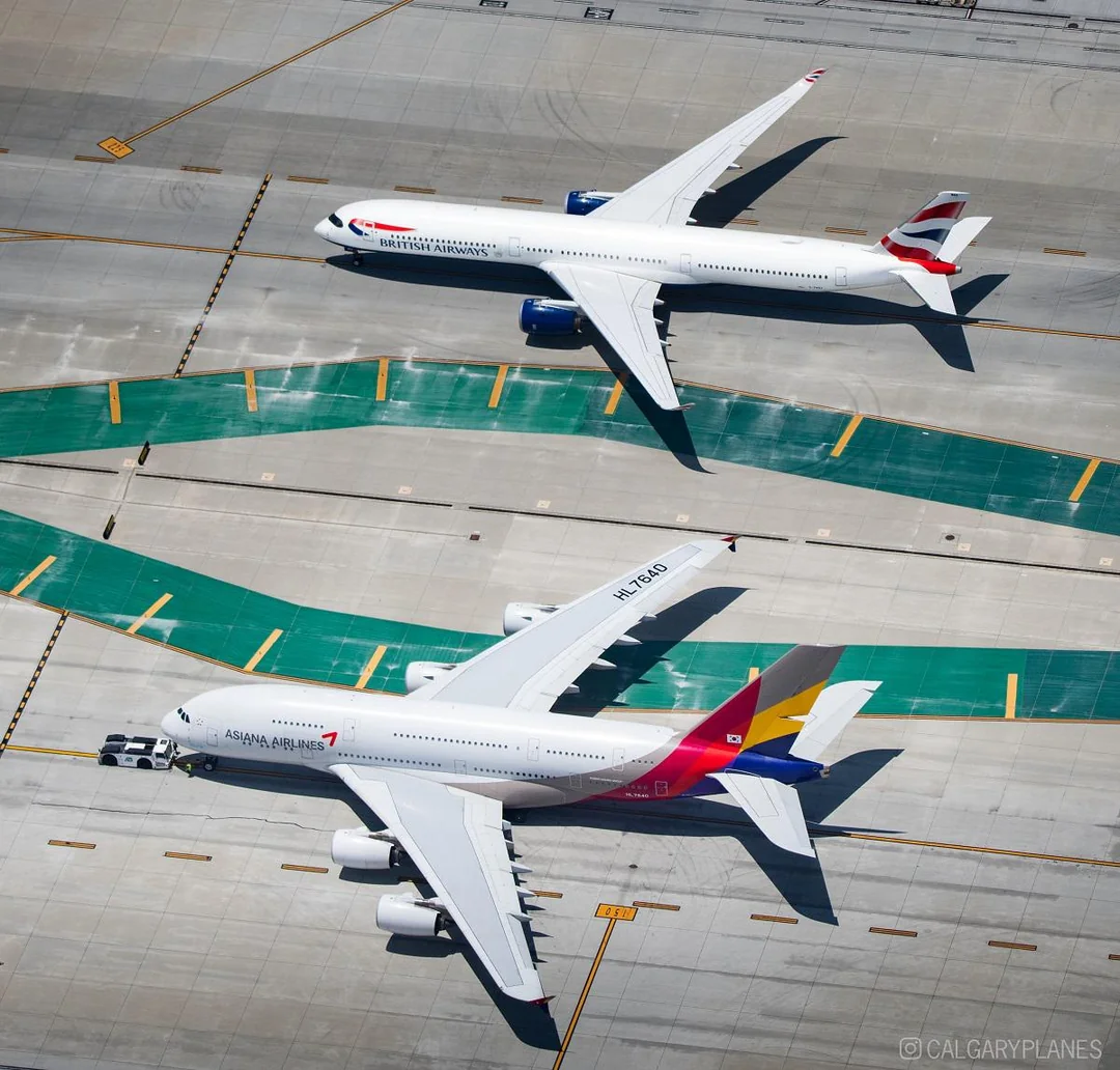 A350 meets A380 at LAX — the aircraft that cut structural maintenance costs by 50% alongside the aluminium-heavy predecessor it replaced.