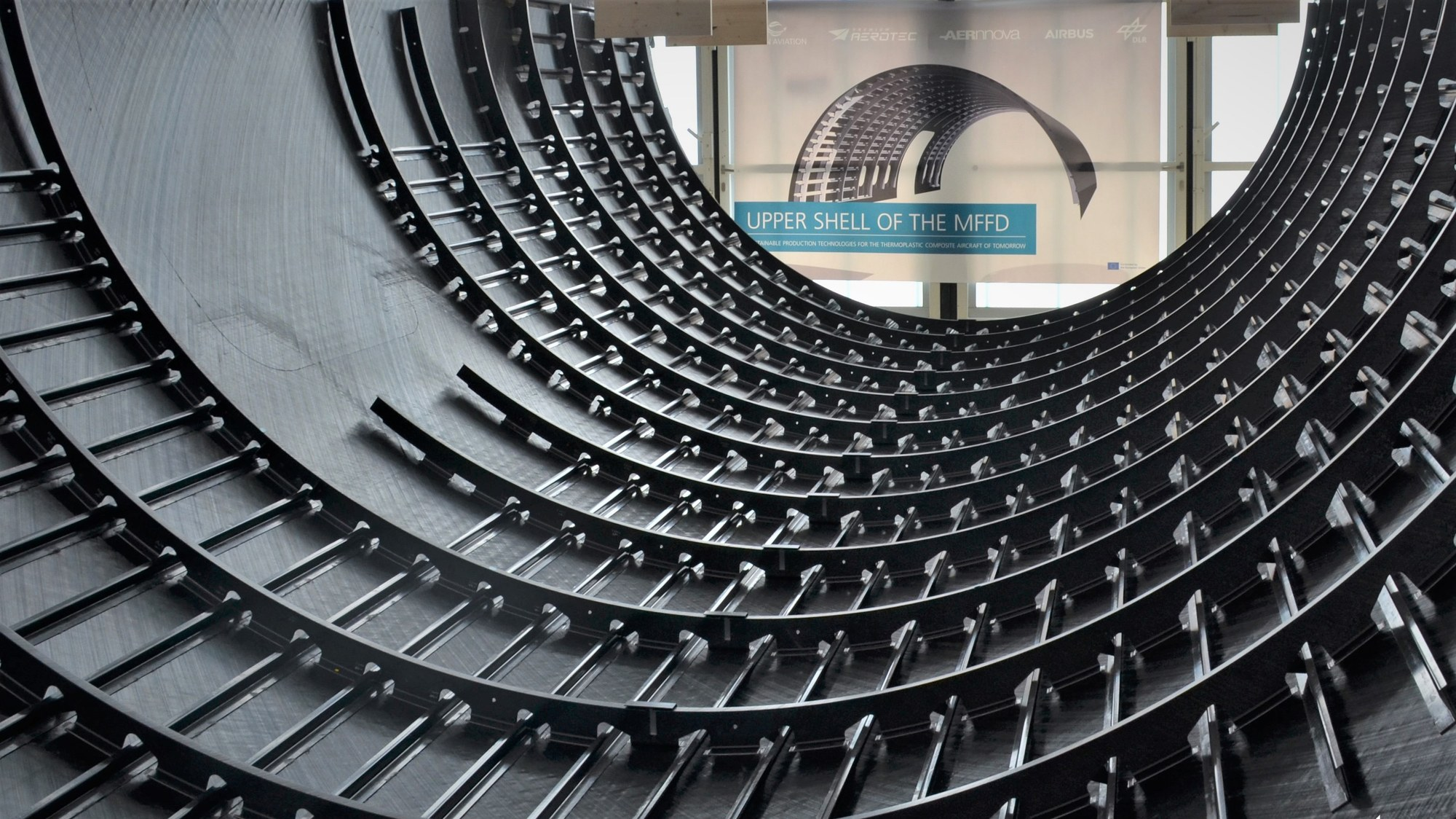 The thermoplastic upper shell of the MFFD — stringers welded to skin without a single autoclave cycle or structural fastener.