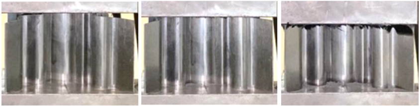 Sequential photographs of tapered SL4 carbon fibre crash box under axial compression