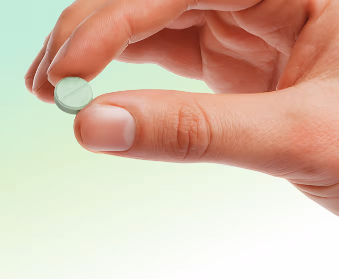 Hand holding medication