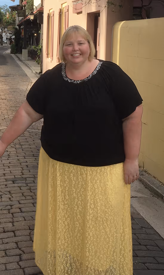 Woman smiling proudly