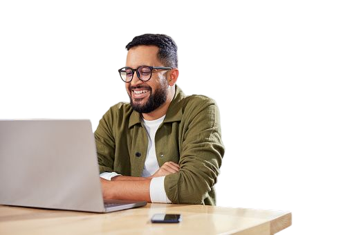 Smiling man working on a laptop