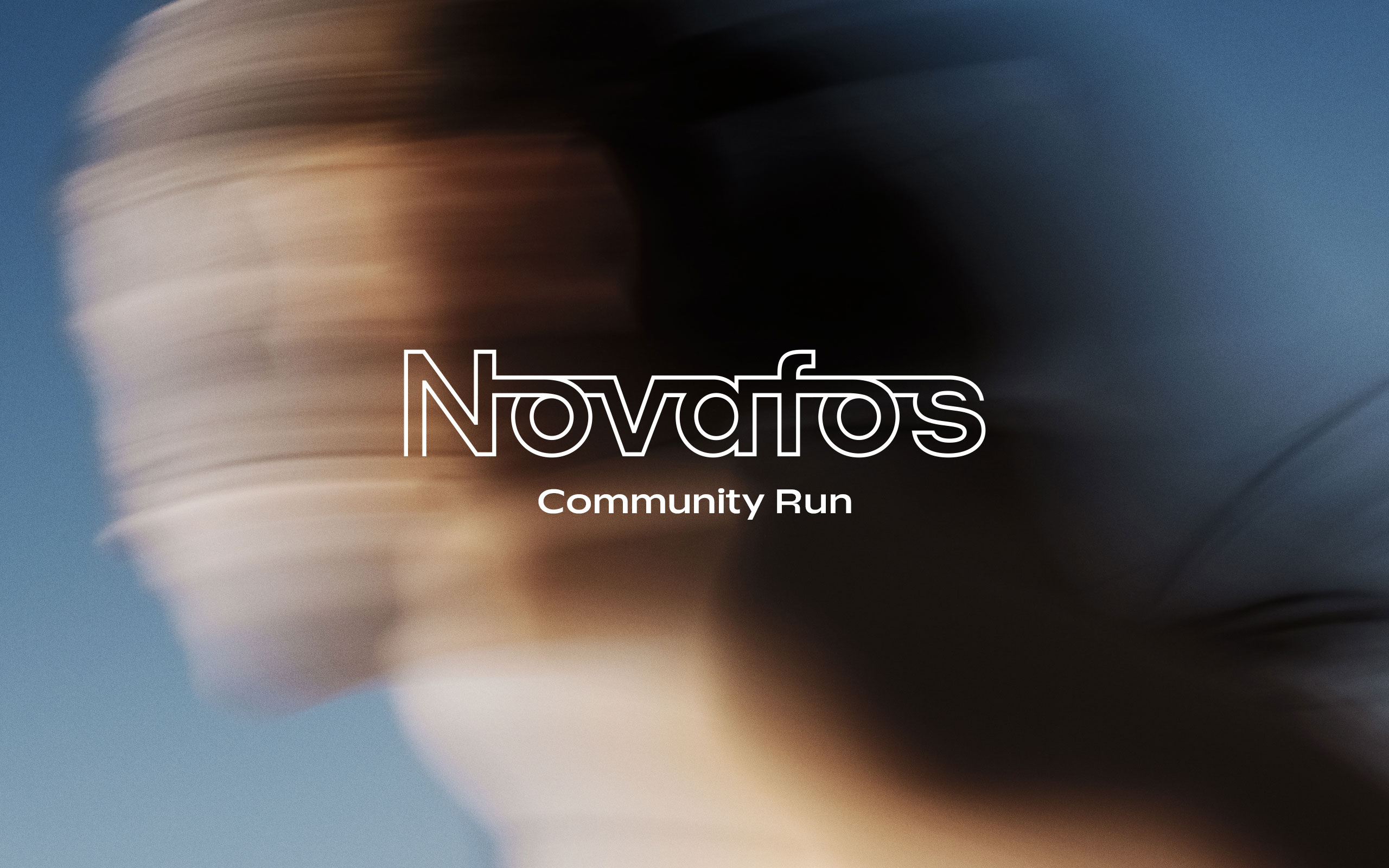Motion-blurred image of a runner in motion with a clear blue sky background, overlaid with the stylized white logo text “Novafos” and subtitle “Community Run.” The dynamic blur effect suggests speed and energy, visually representing fitness, athleticism, and outdoor physical activity. Branding for a community fitness event, running campaign, or local sports initiative. 