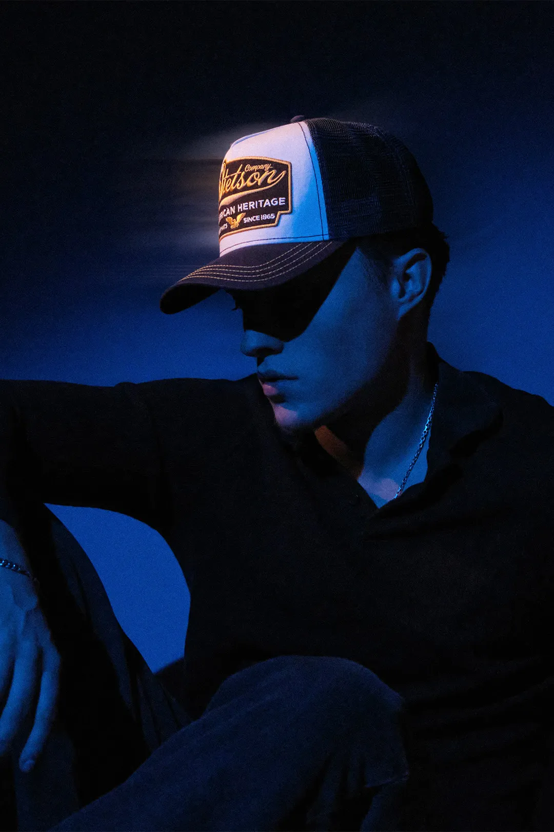 Patrick Pankalla’s project thumbnail of artist Asger in a Stetson hat, featuring dramatic blue studio lighting.