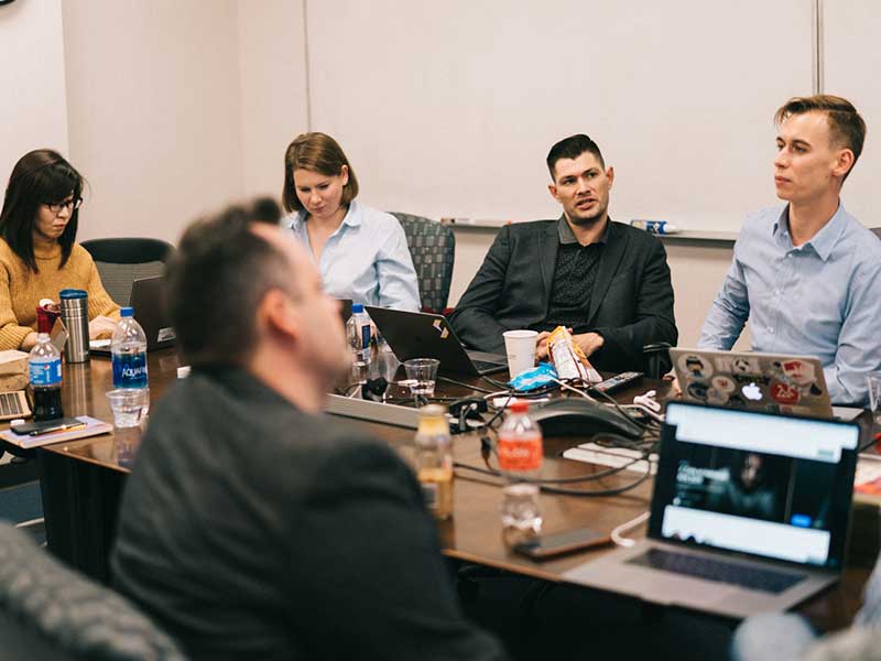 MGM digital ventures product managers and developers talking about an initiative.