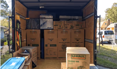 Moving boxes loaded inside a moving truck