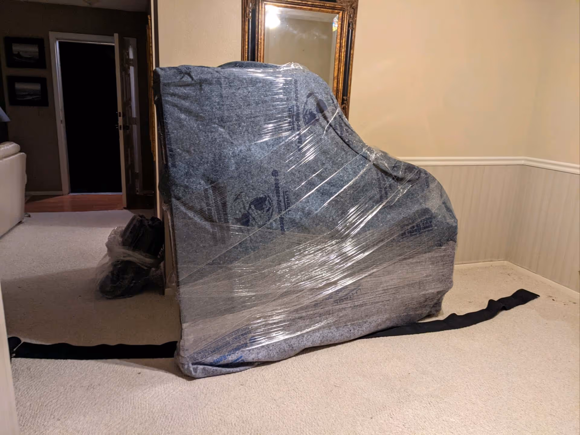 Grand Piano wrapped before transportation
