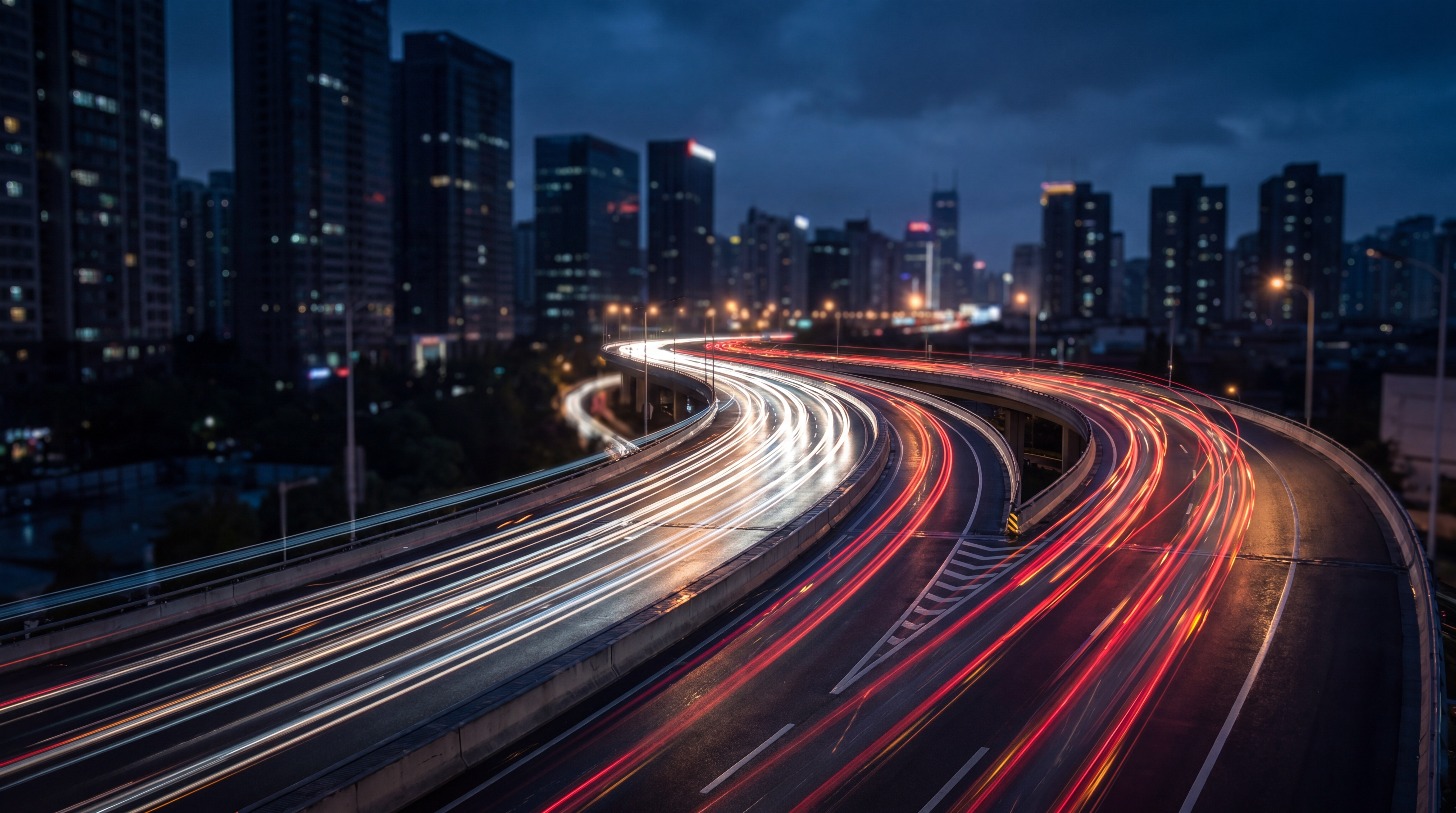 Traffic moving along an urban freeway at night