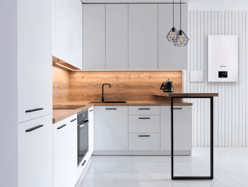 A glow-worm boiler on a wall in a modern kitchen
