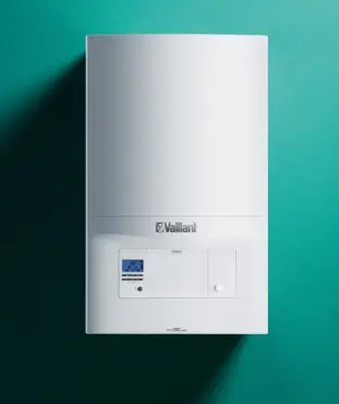 A Vailllant combi boiler on a green background