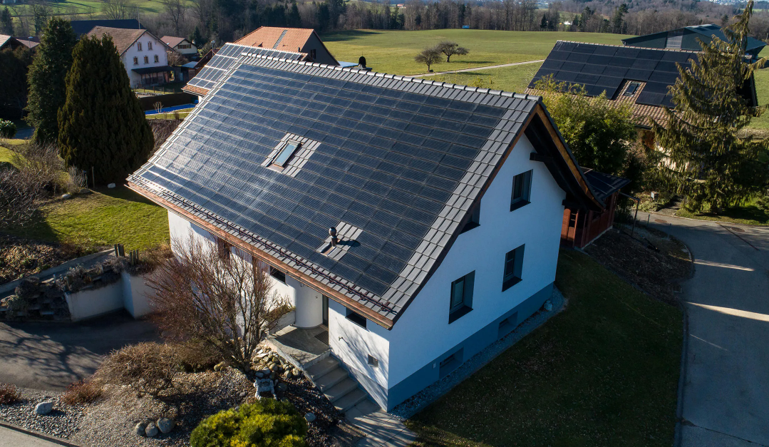 Perlight Solar panels on a countryside roof