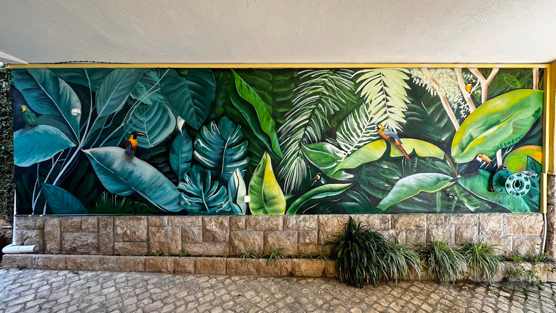 Tropical environment wall painting with colourful birds