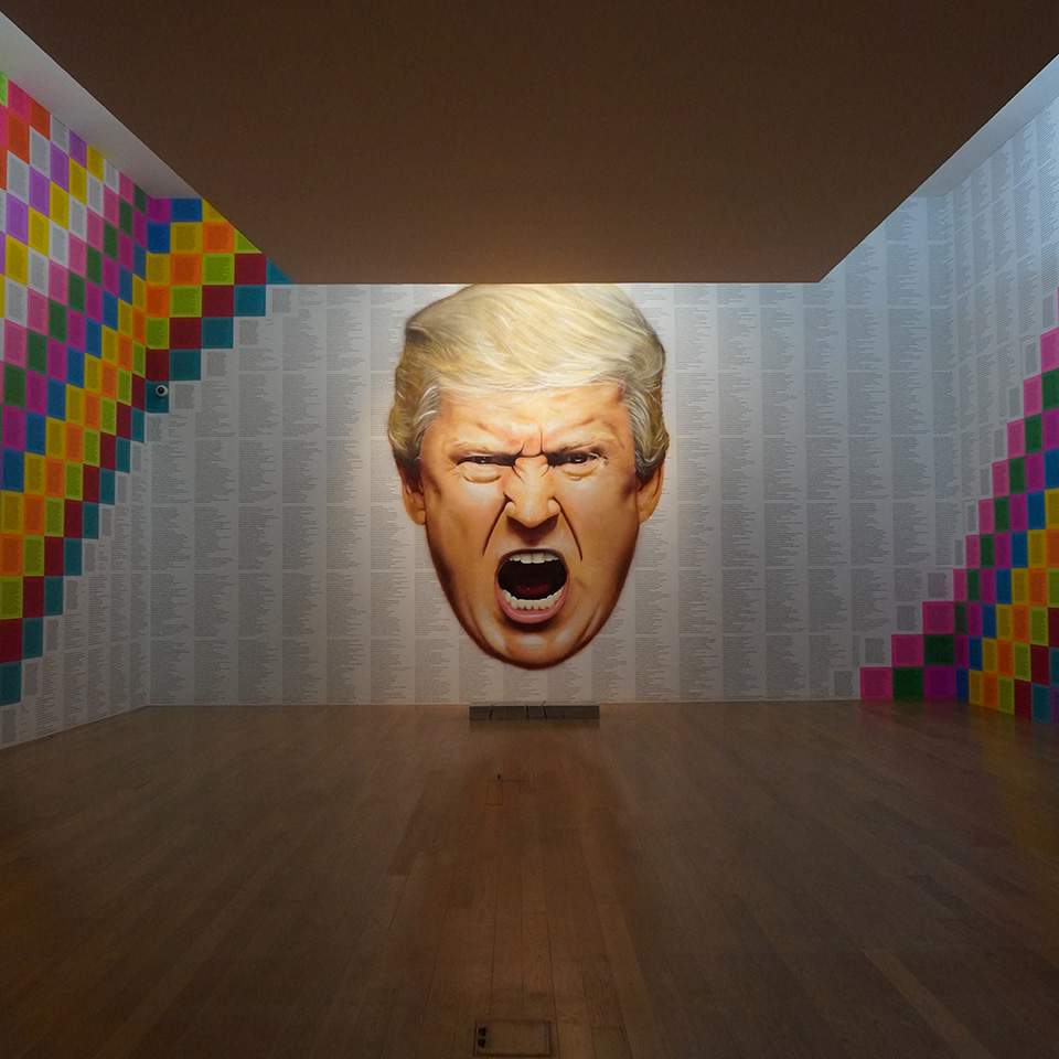 Portrait of a blonde man screaming painted over truisms