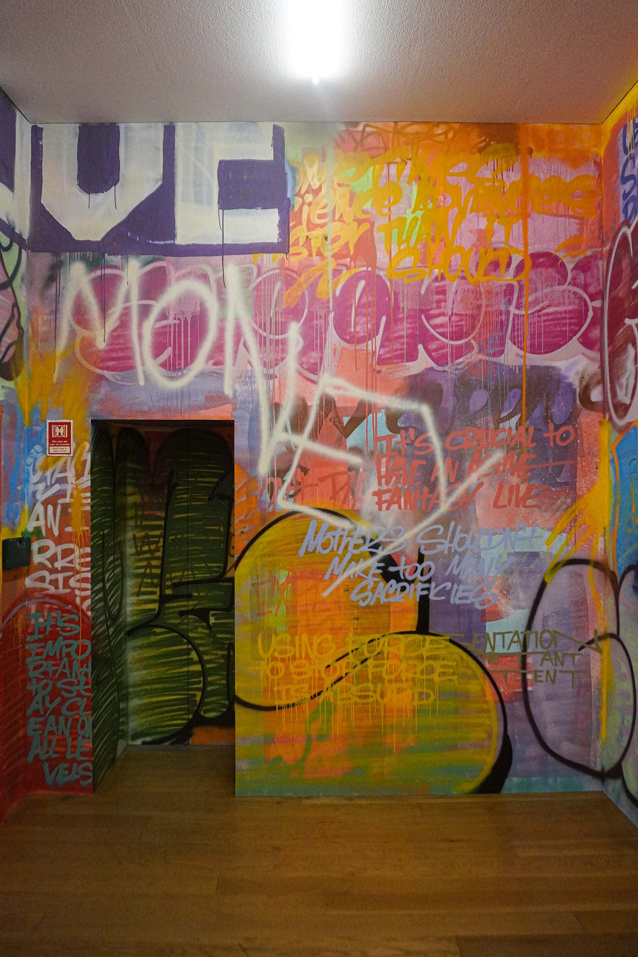Graffiti truisms written on a wall