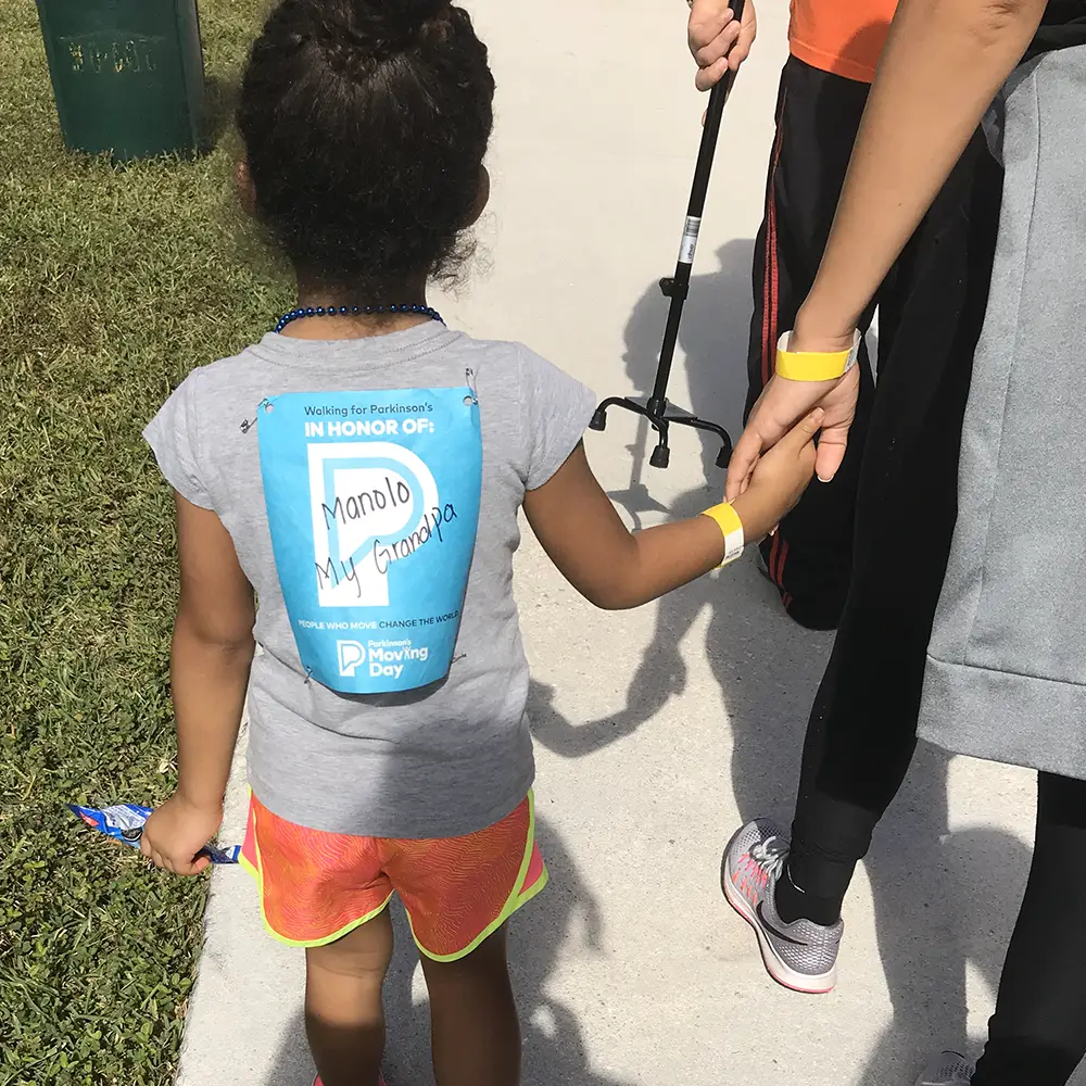 kid with back bib