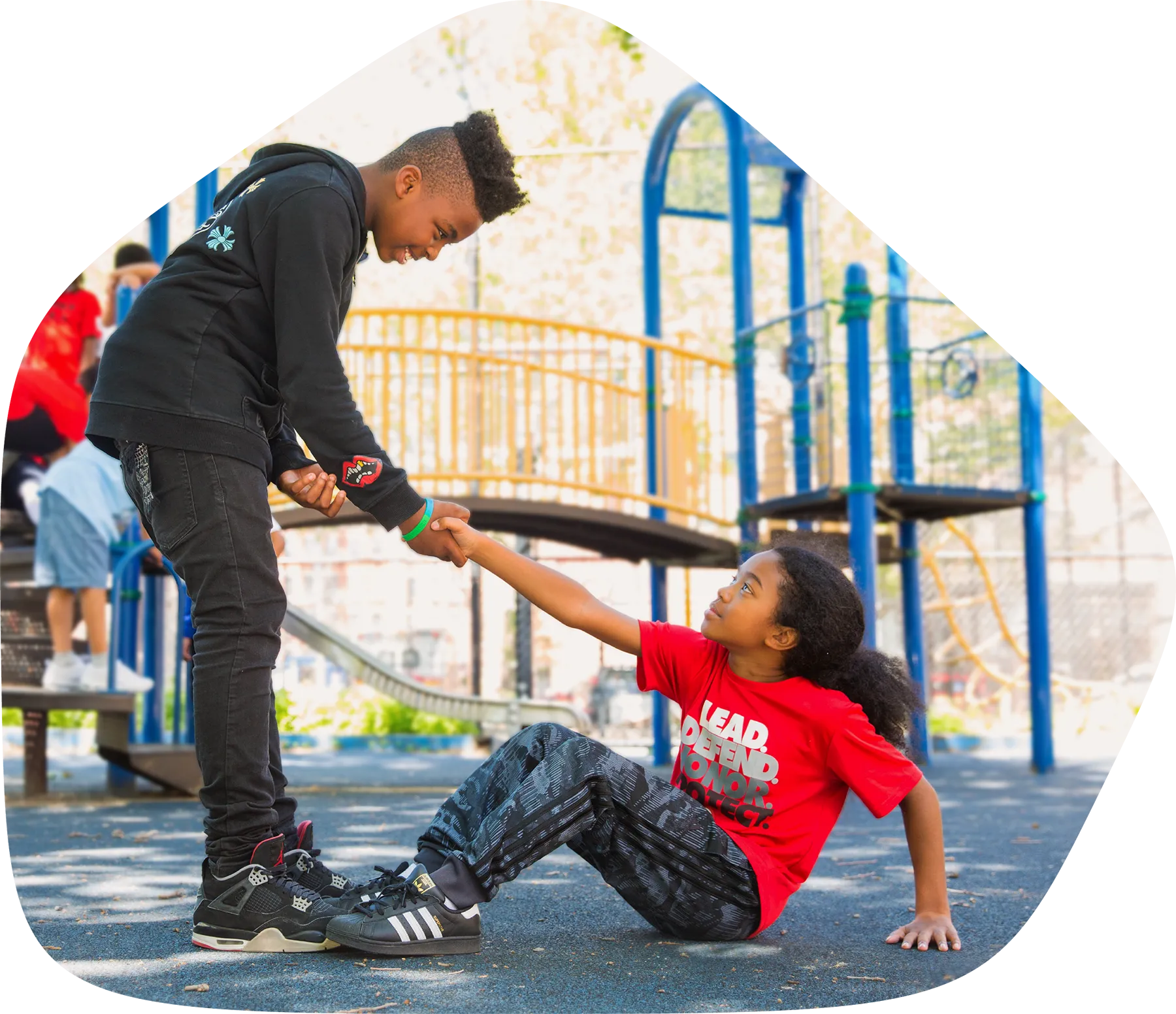 photo of one student helping another