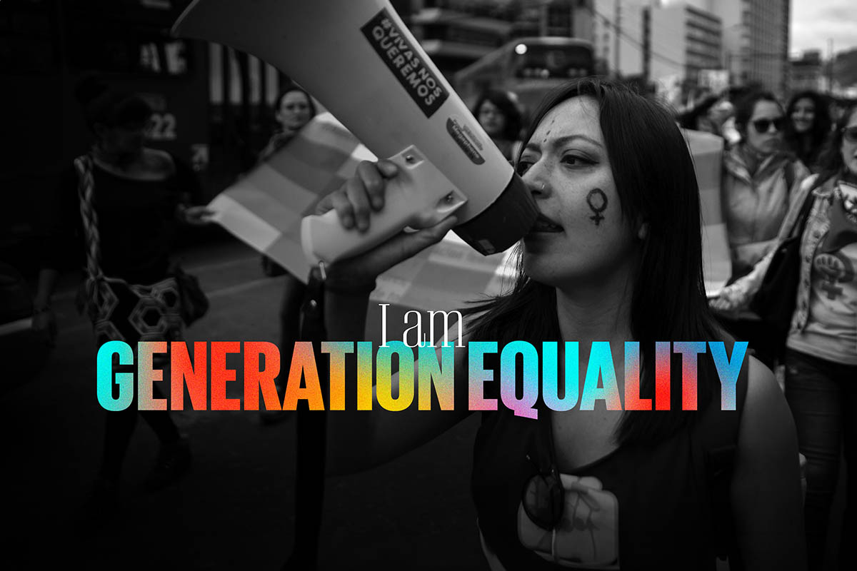 Woman holding a megaphone and the words I am Generation Equality
