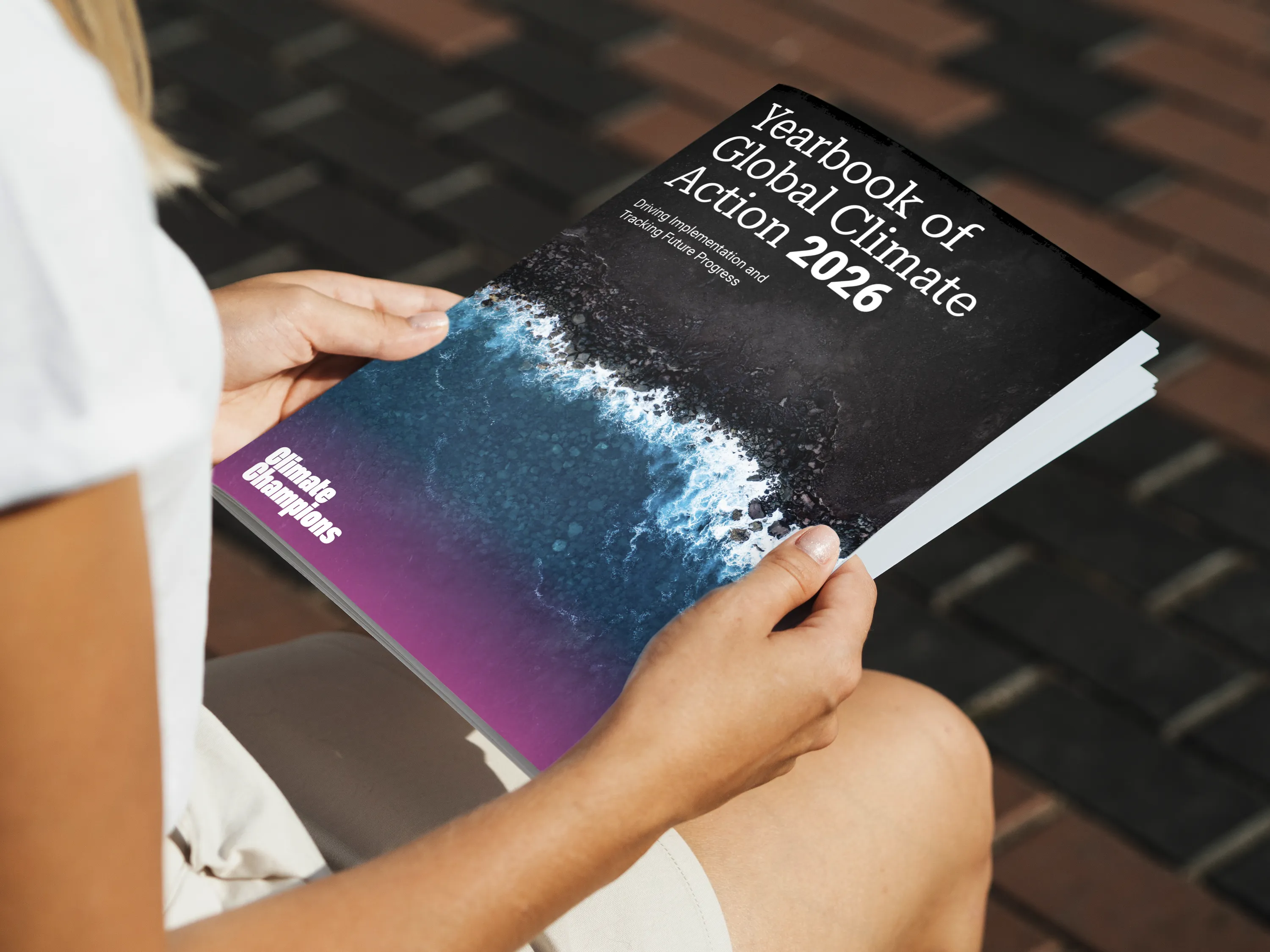 Mockup of a brochure held in hands.