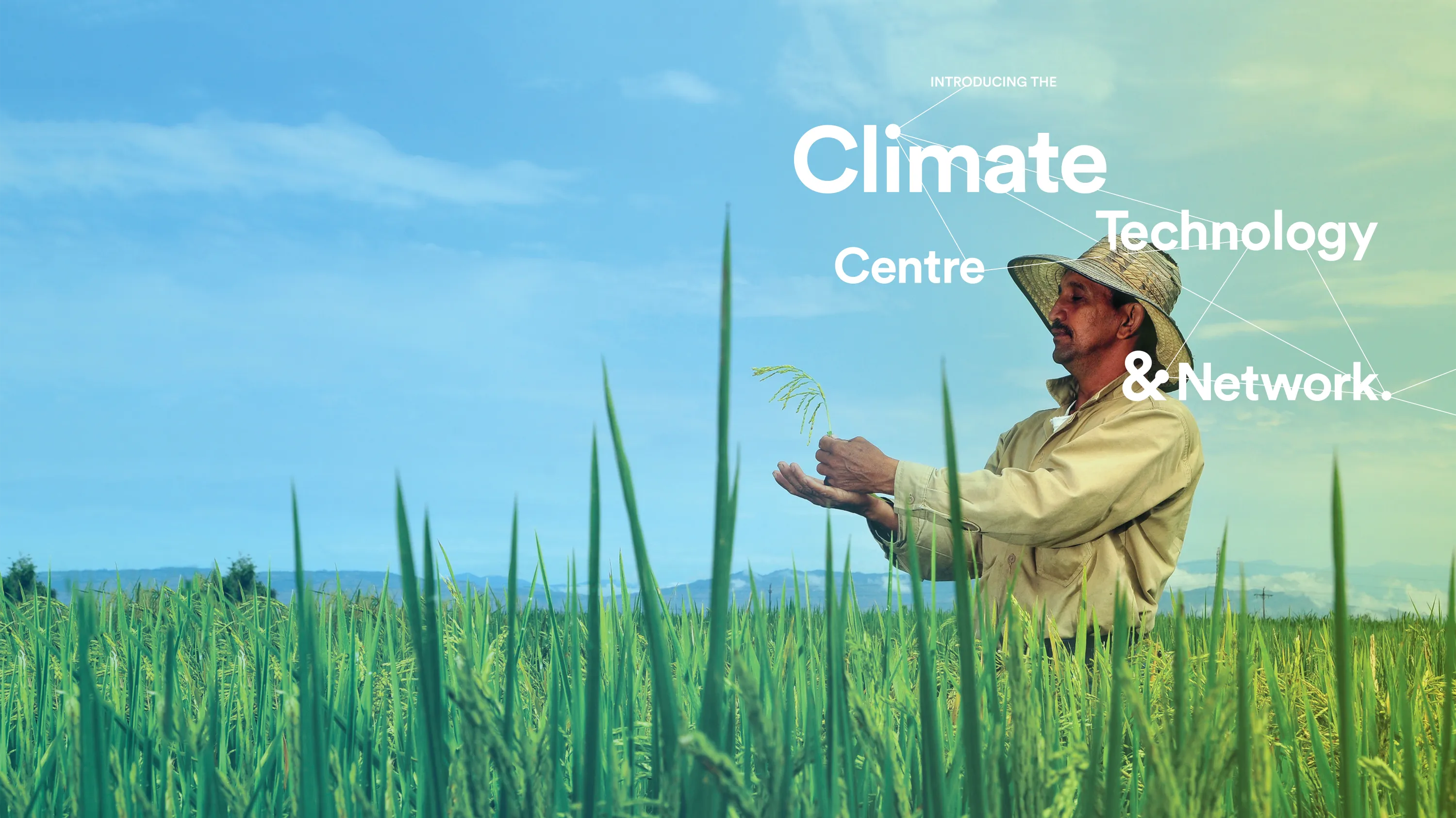 Graphic of a man in a field with the words Climate Technology Centre & Network.