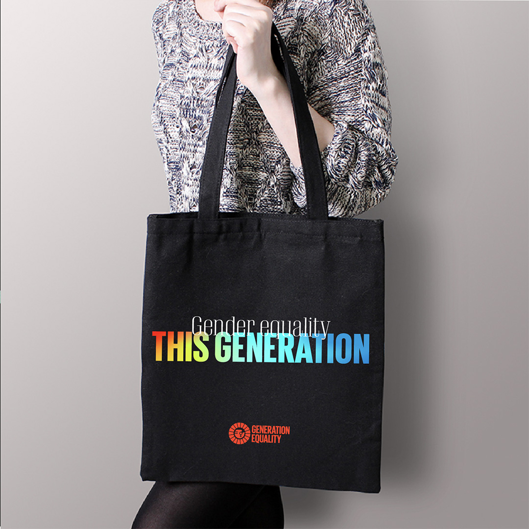 Tote bag with generation Equality graphic on it.