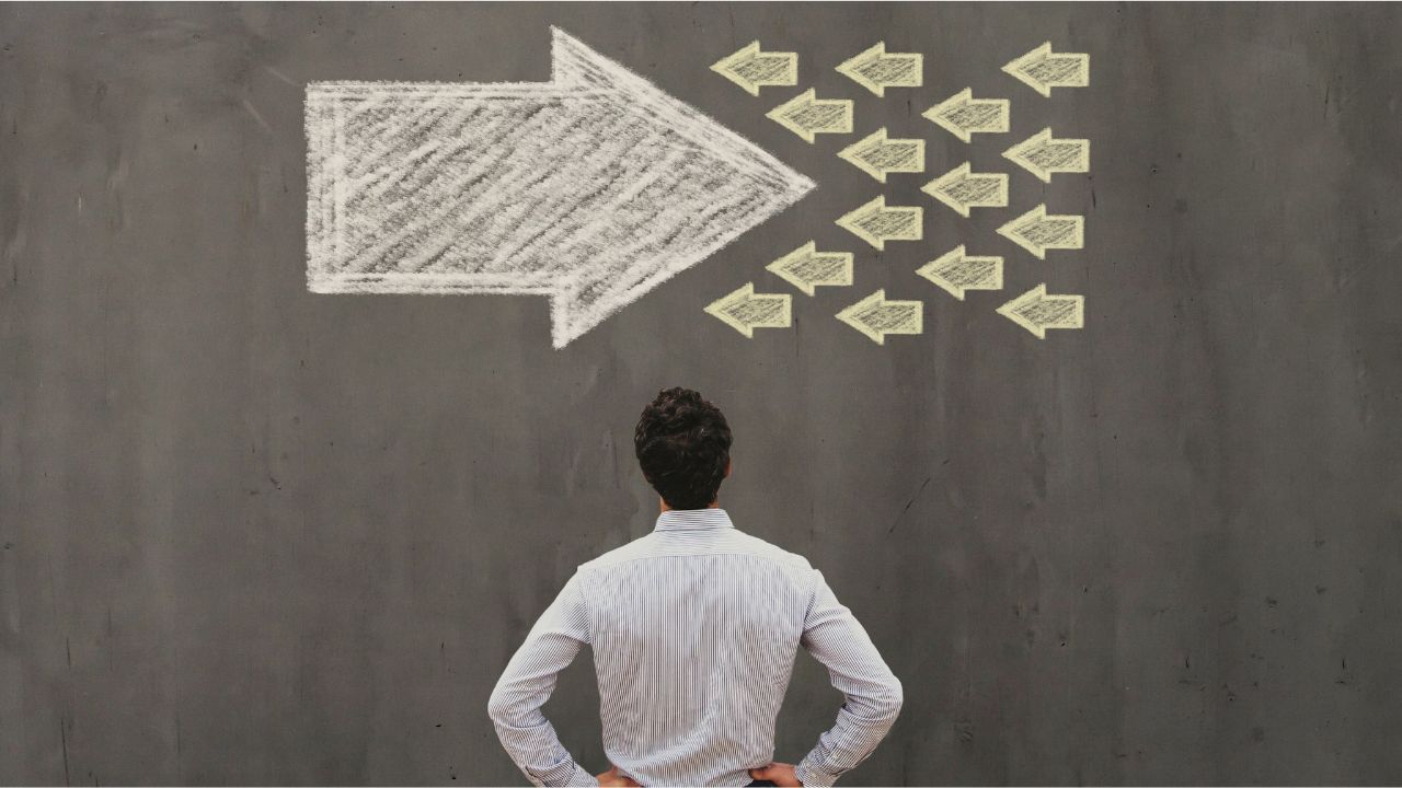 Person releasing emotional weight, symbolising freedom through self-acceptance and authentic living