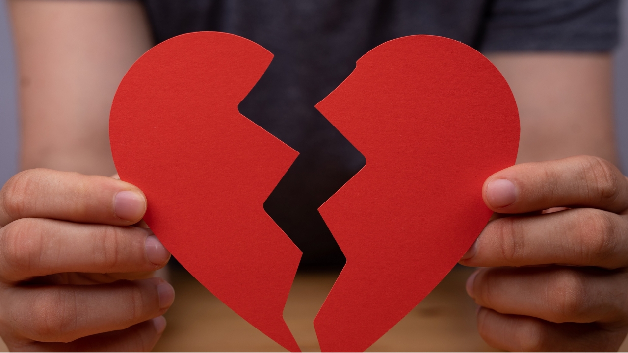 Person reflecting on their past with gratitude, symbolising the strength found in honouring your struggles