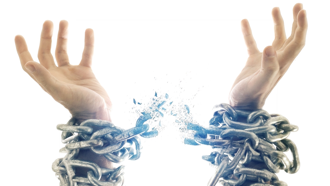 Person letting go of emotional baggage, representing the freedom that comes from reframing mistakes as learnings