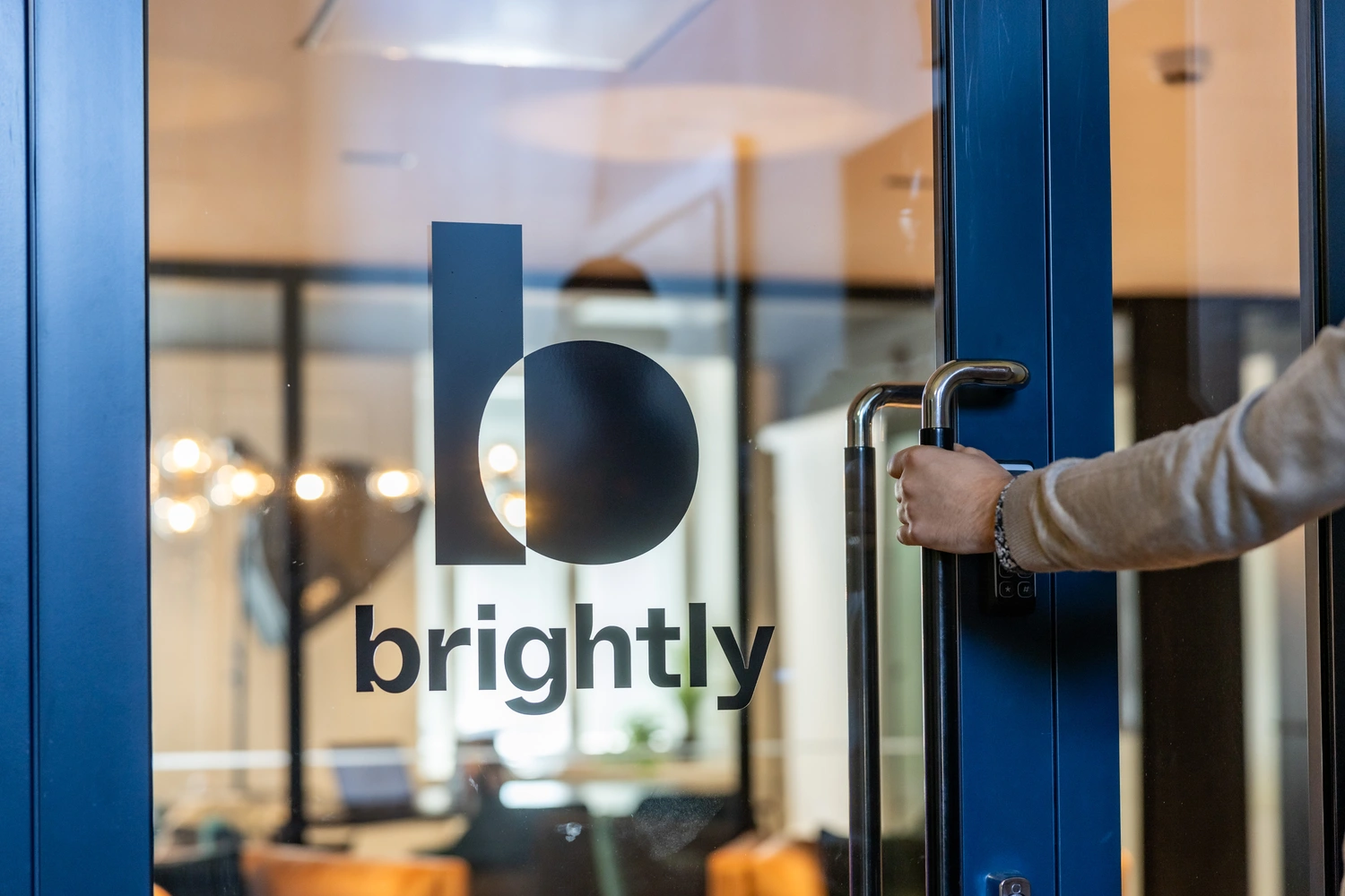 Brightly logo on a glass door