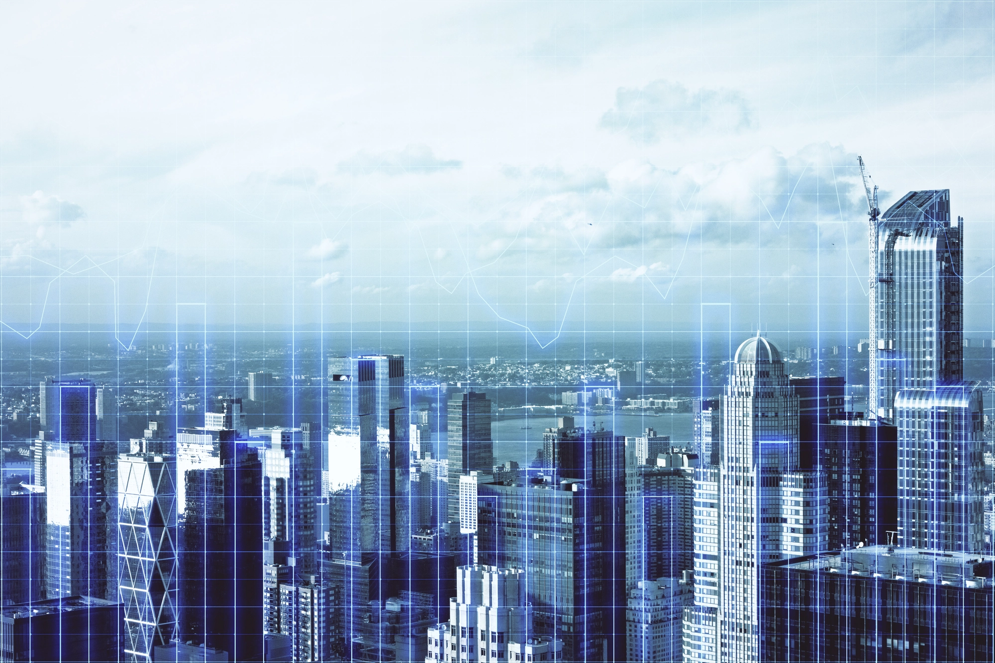 City skyline with a stock graph graphic