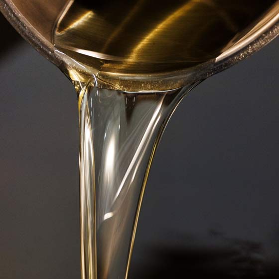 Assorted crispy breaded chicken dishes including chicken goujons, chicken nuggets, and chicken kievs served with a bowl of creamy dipping sauce and fresh cherry tomatoes.