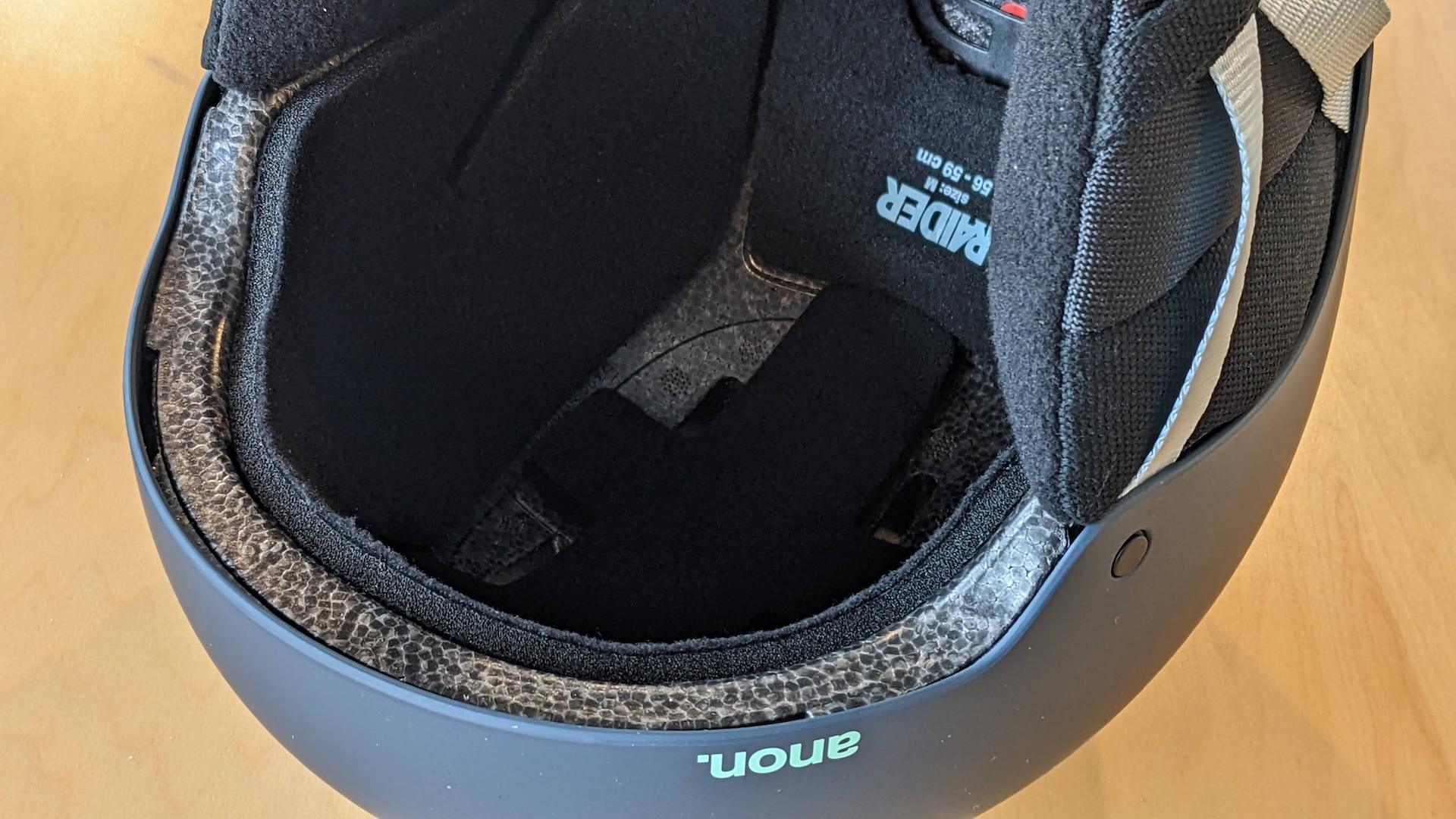 Burton / Anon — inside the reference helmet: foam liner, padding, and size label used to model the interior (photo) | ANCORD Design Co