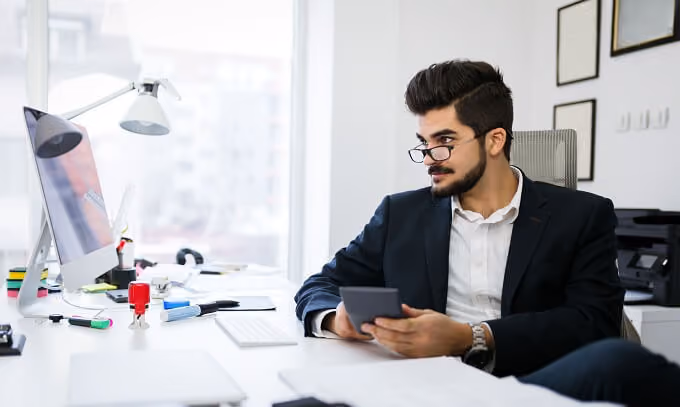 Man looking through standard rental applications