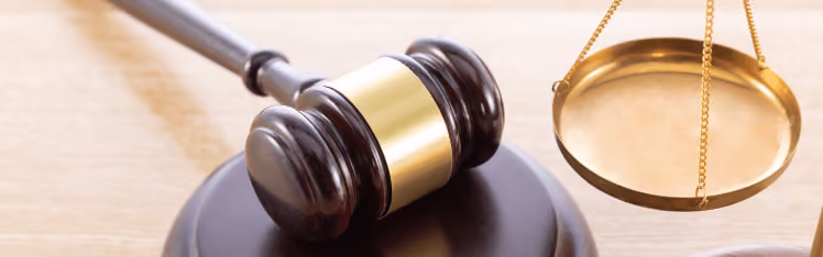 Image of a gavel as a metaphor for the seriousness of California tenant screening laws