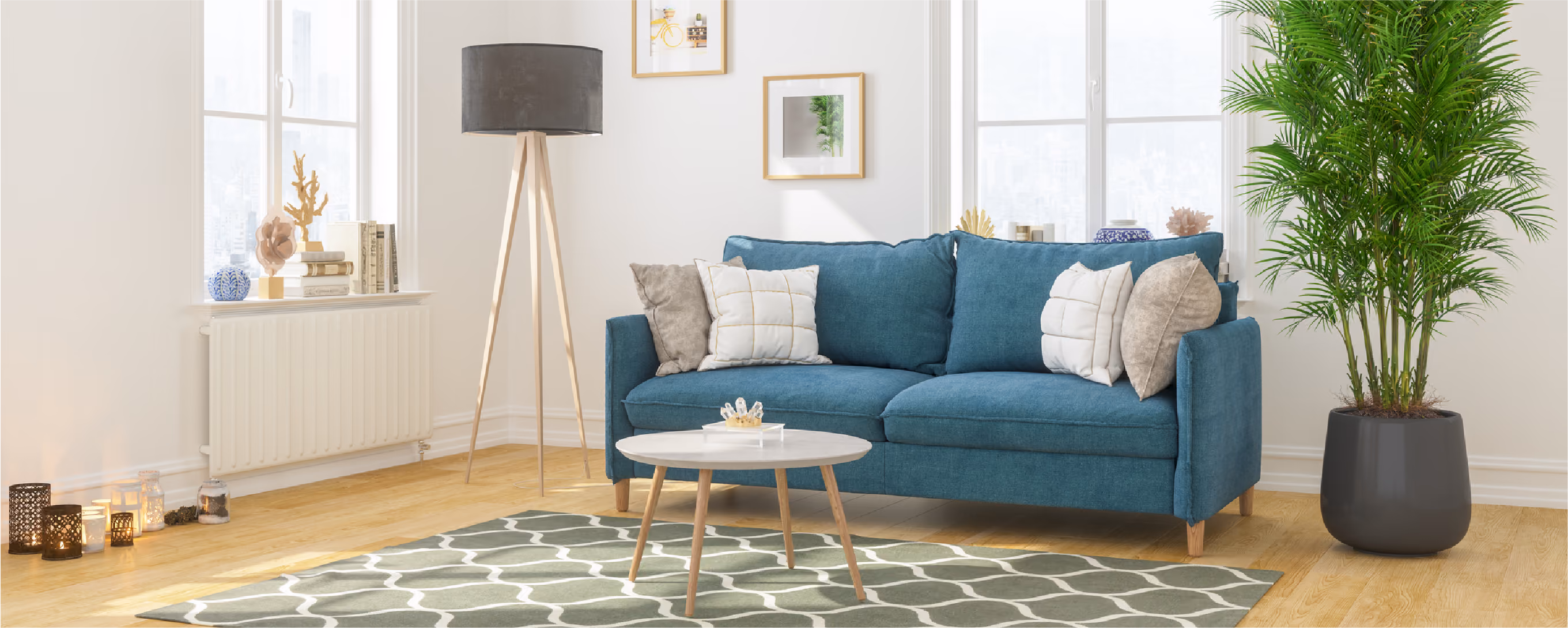Turquoise sofa with a green carpet and circular table in front. Standing lamp and plan next to the couch|chart with colors listed on the left side and corresponding emotions next to each color|Beige sofa with blue wall and art hanging. In the foreground, a carpet, circular wood table, and wood chair|White open kitchen with three lights hanging above the island|Condo apartment with orange couch, carpet, and open white kitchen in the background|Download button with blue and green background|