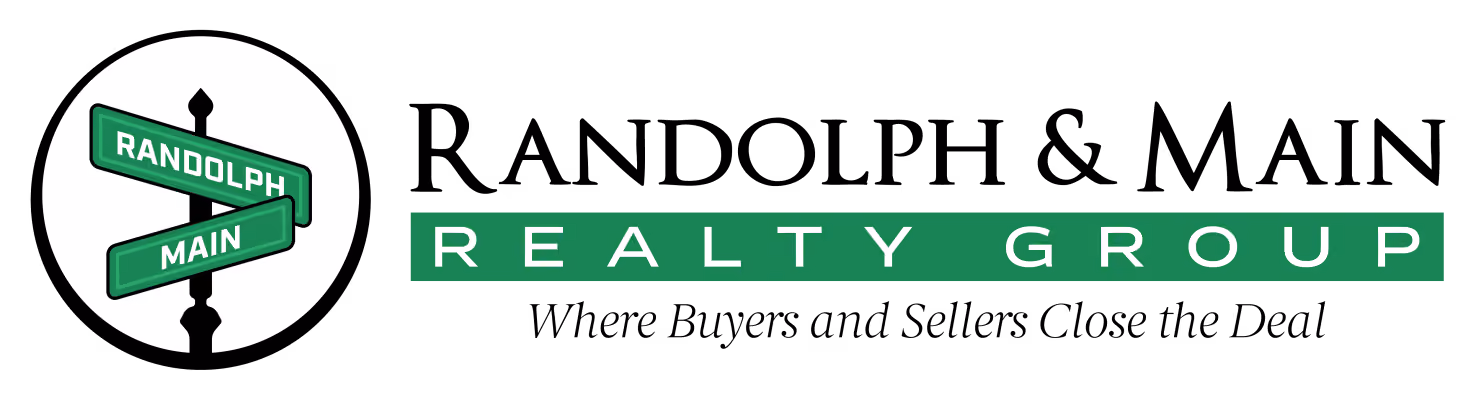 Logo with green street signs reading Randolph and Main beside text Realty Group in green background.