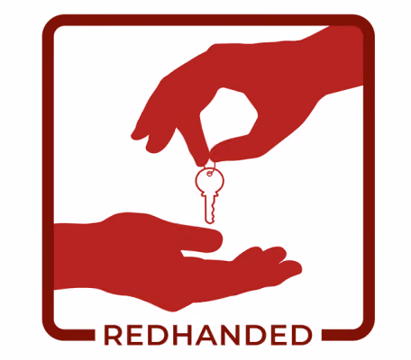 Red silhouette of hand passing a key to another hand inside a rounded square with 'REDHANDED' below.