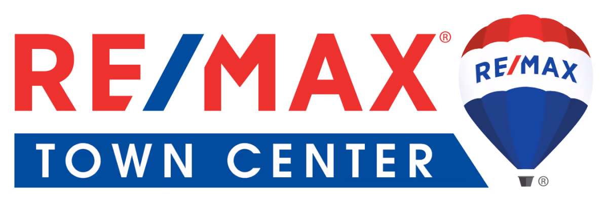RE/MAX Town Center logo with red, blue text and a hot air balloon in red, white, and blue.