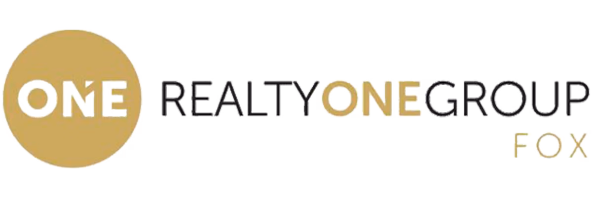 Logo with text: ONE Realty One Group Fox, with ONE in a gold circle on the left.