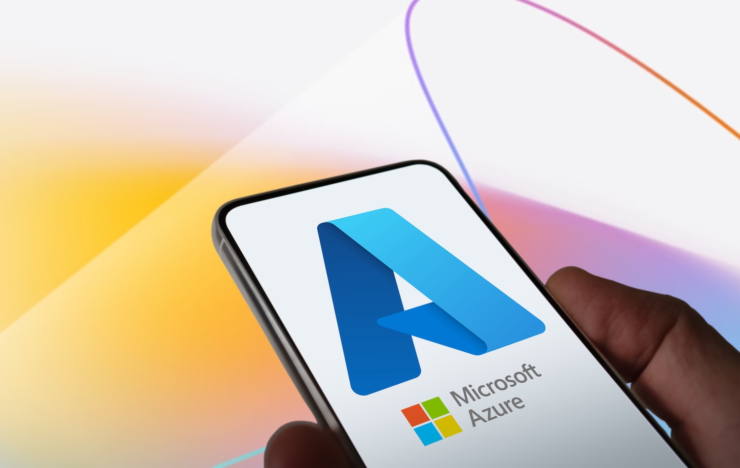 hand holding a phone with a clean logo of Microsoft Azure Cloud