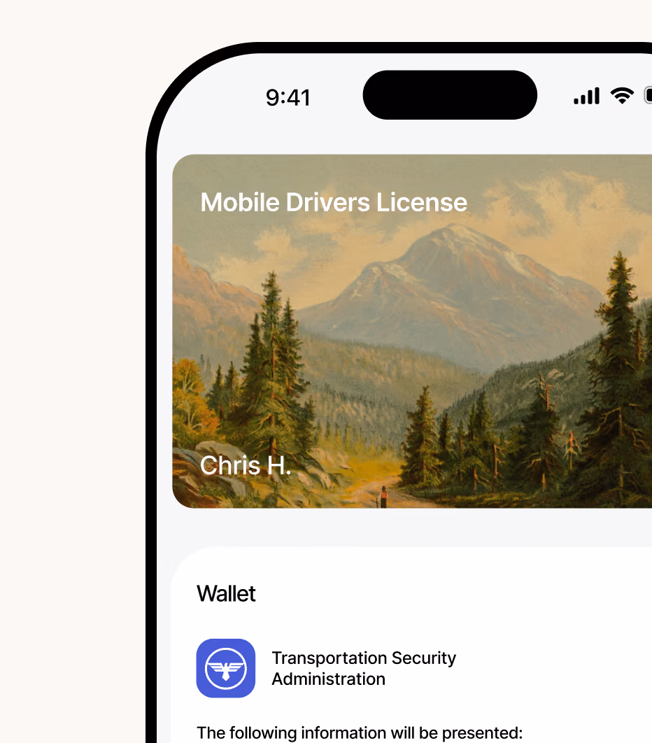 Mobile Drivers License with mountain landscape background and name Chris H. displayed in a digital wallet app.