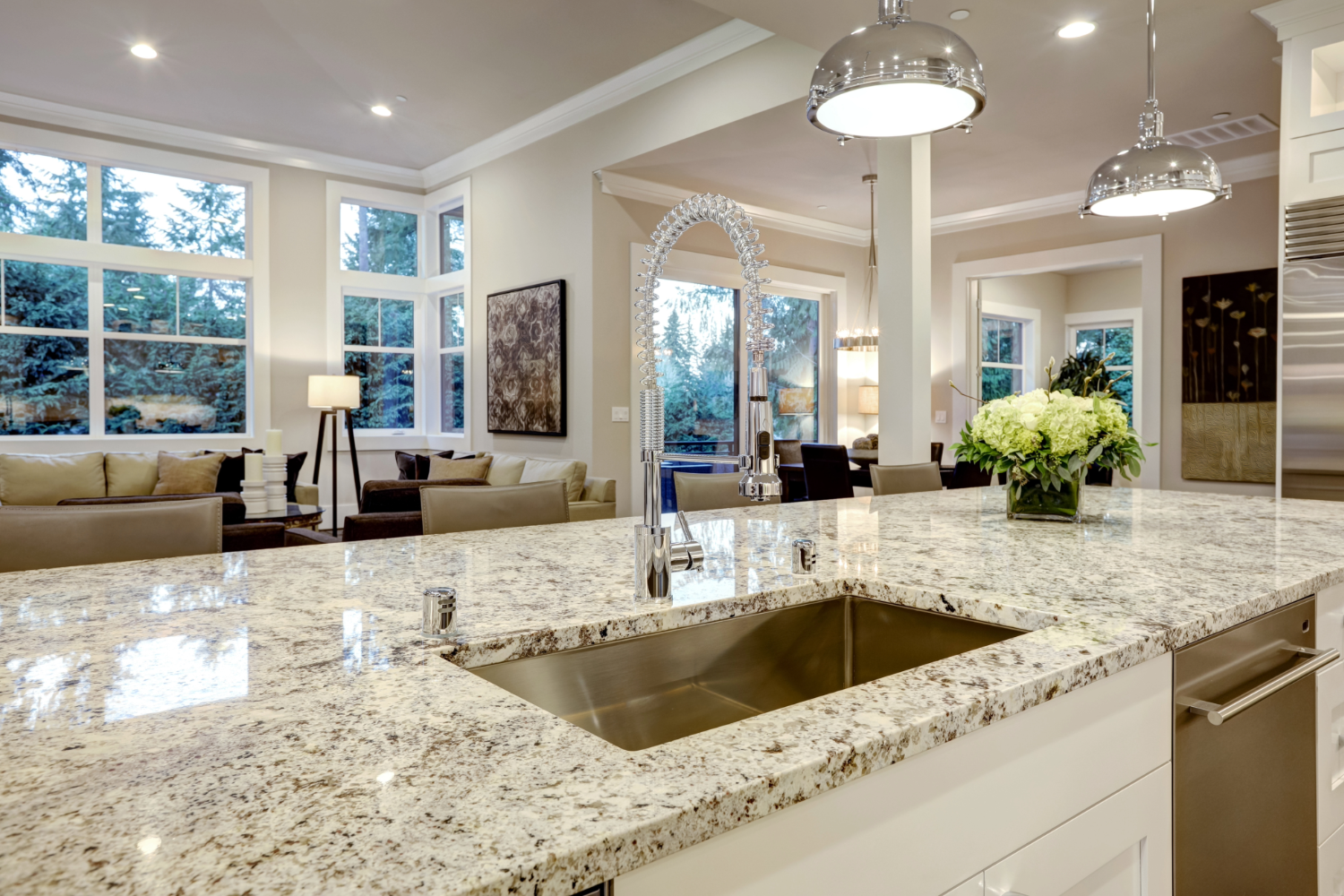 Kitchen island with light granite countertop.