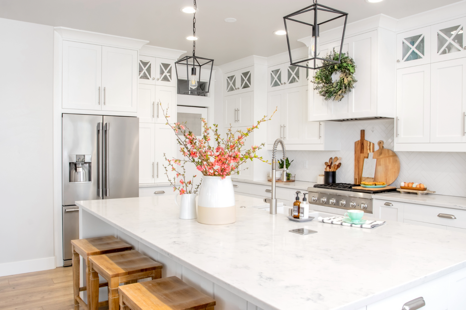 Bright kitchen with white marble island.