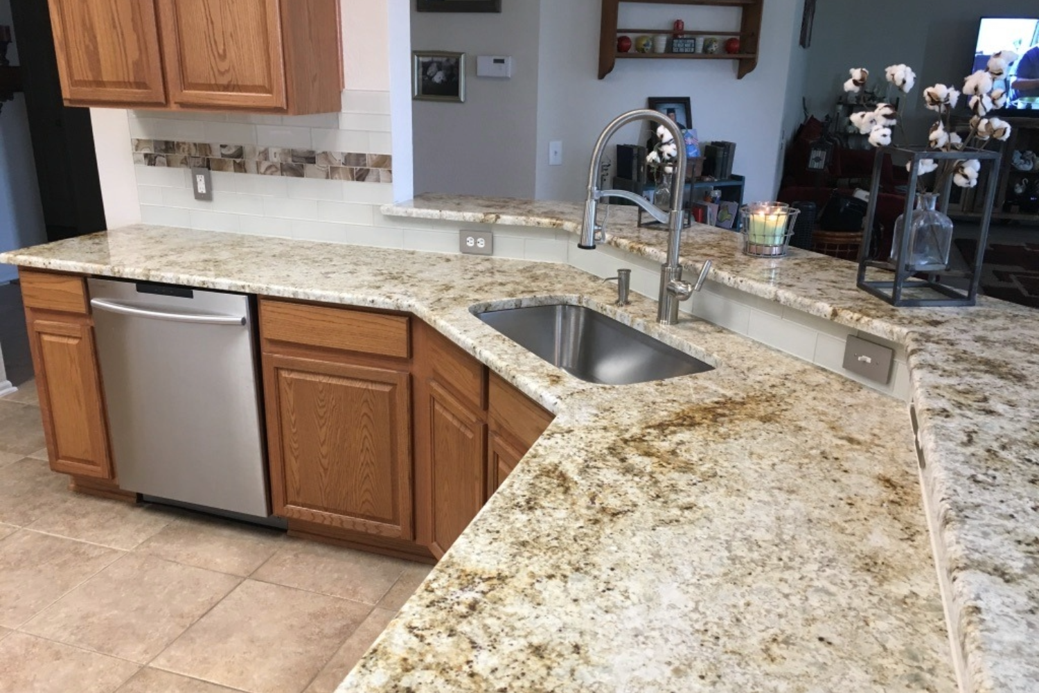 Kitchen with custom granite countertops and undermount sink