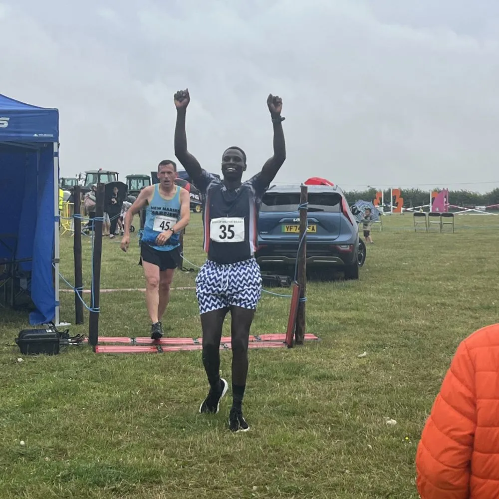 The Bishop Wilton Show Beast Run runner at the winning post