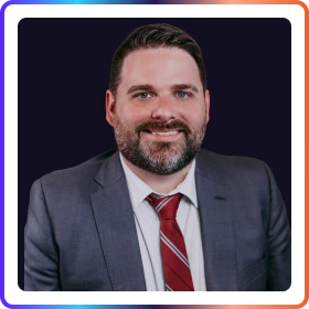 Sean Hightower professional headshot smiling, business casual attire against a soft gray background