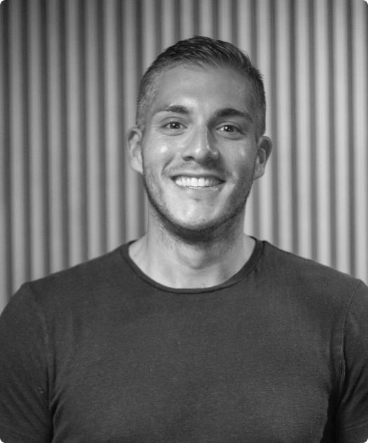 A black and white photo of Vinny Pisano, Head of People for Rev.