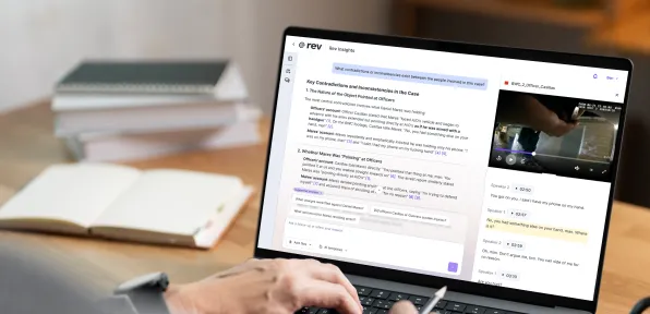 Person using a laptop displaying Rev Insights software with a video and text analysis on screen.