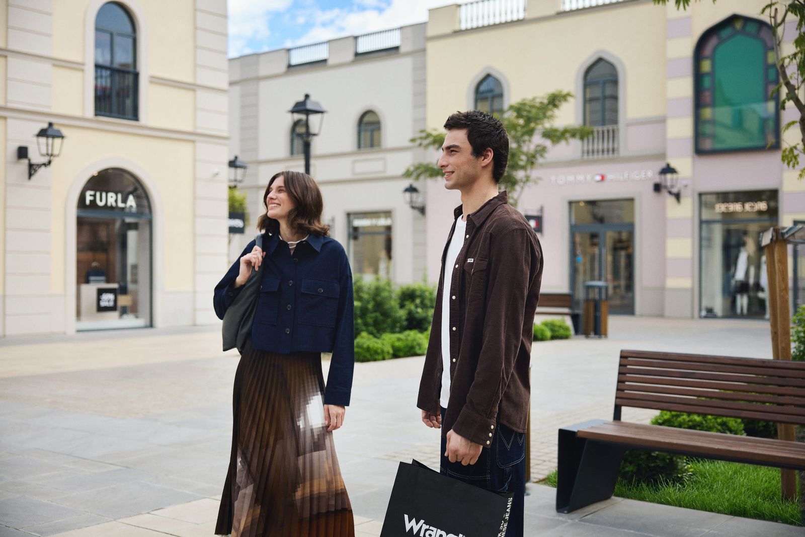 Visitors walking through Tbilisi Outlet Village