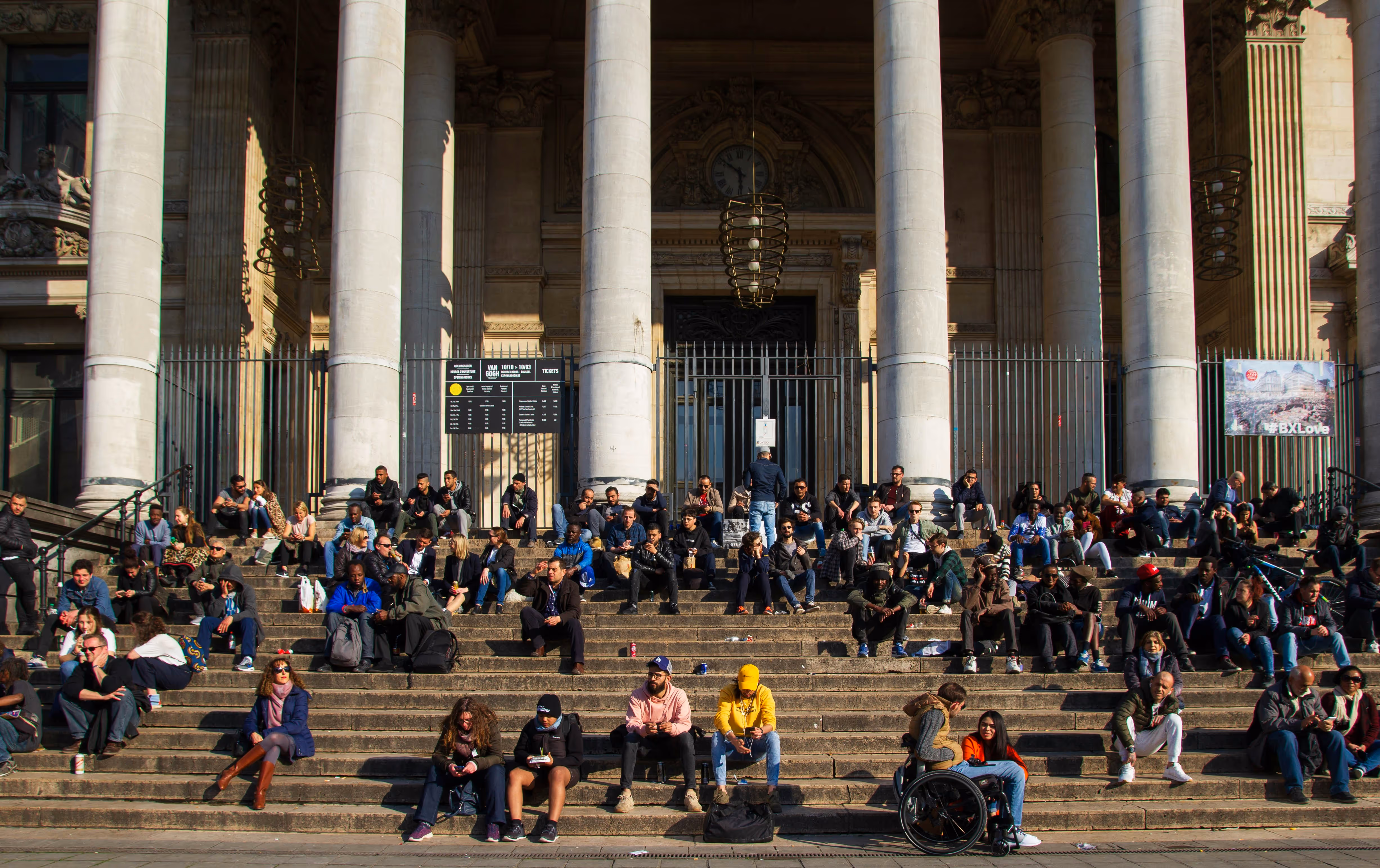 People sitting in front of German Parliament